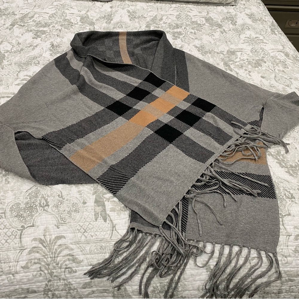Wrap around poncho with arm sleeves